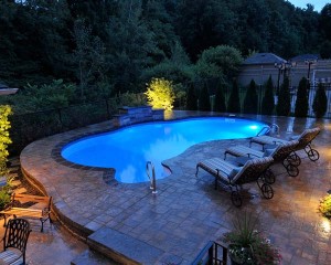 Inground swimming pool at night