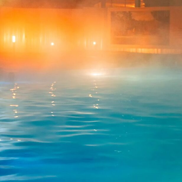 Pool with a haze of fog and glowing orange