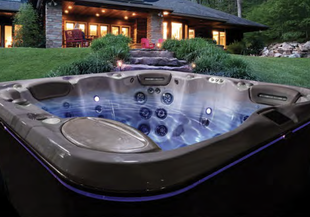 a close up of a hot tub upclose in the evening with light